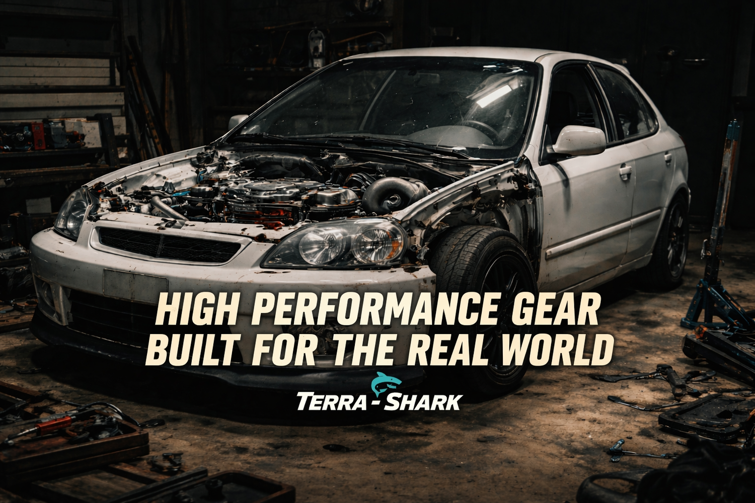 Custom Honda Civic build in garage with Terra-Shark performance apparel branding